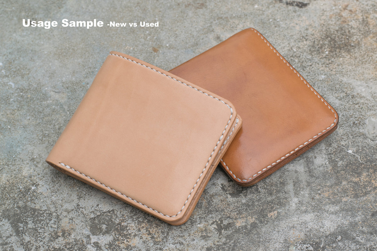 Two leather wallets, one new and one used, showing the difference in color and patina. The new wallet is a light tan color, while the used wallet is a darker brown. Both wallets have white stitching.