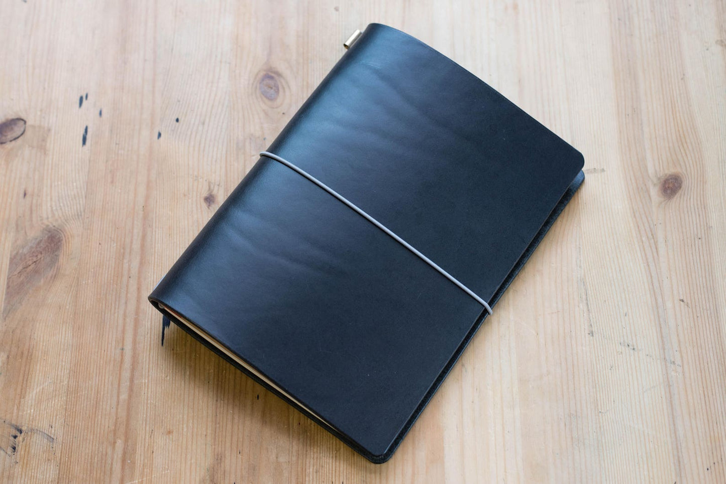 Black Buttero Leather Traveler's Notebook Cover with grey elastic