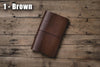 Brown Buttero Leather Trifold Traveler's Notebook Cover with brown elastic