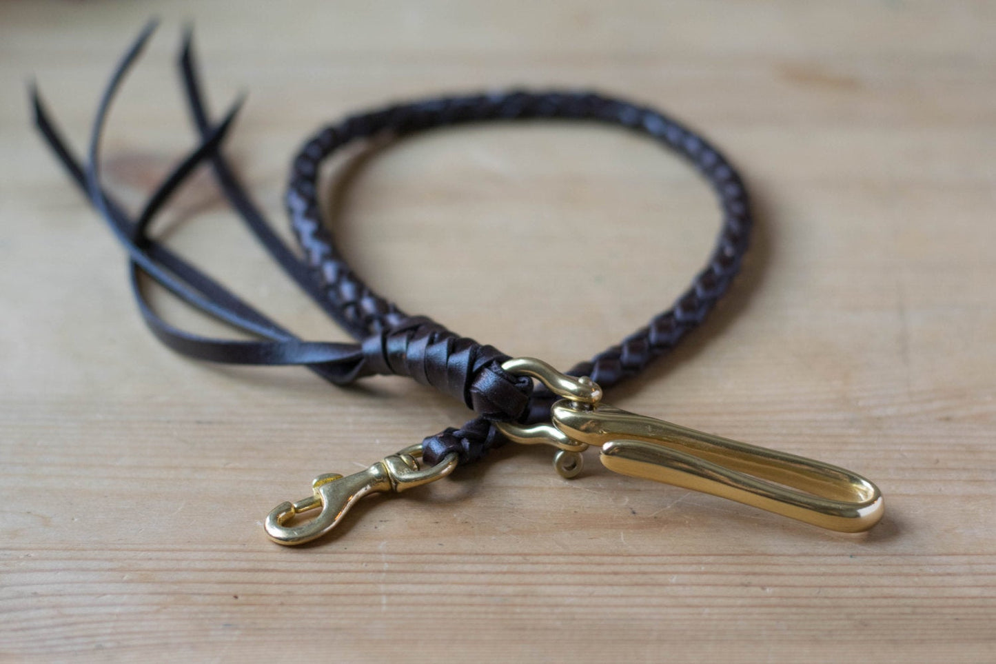 Brown braided leather strap with solid brass hardware 