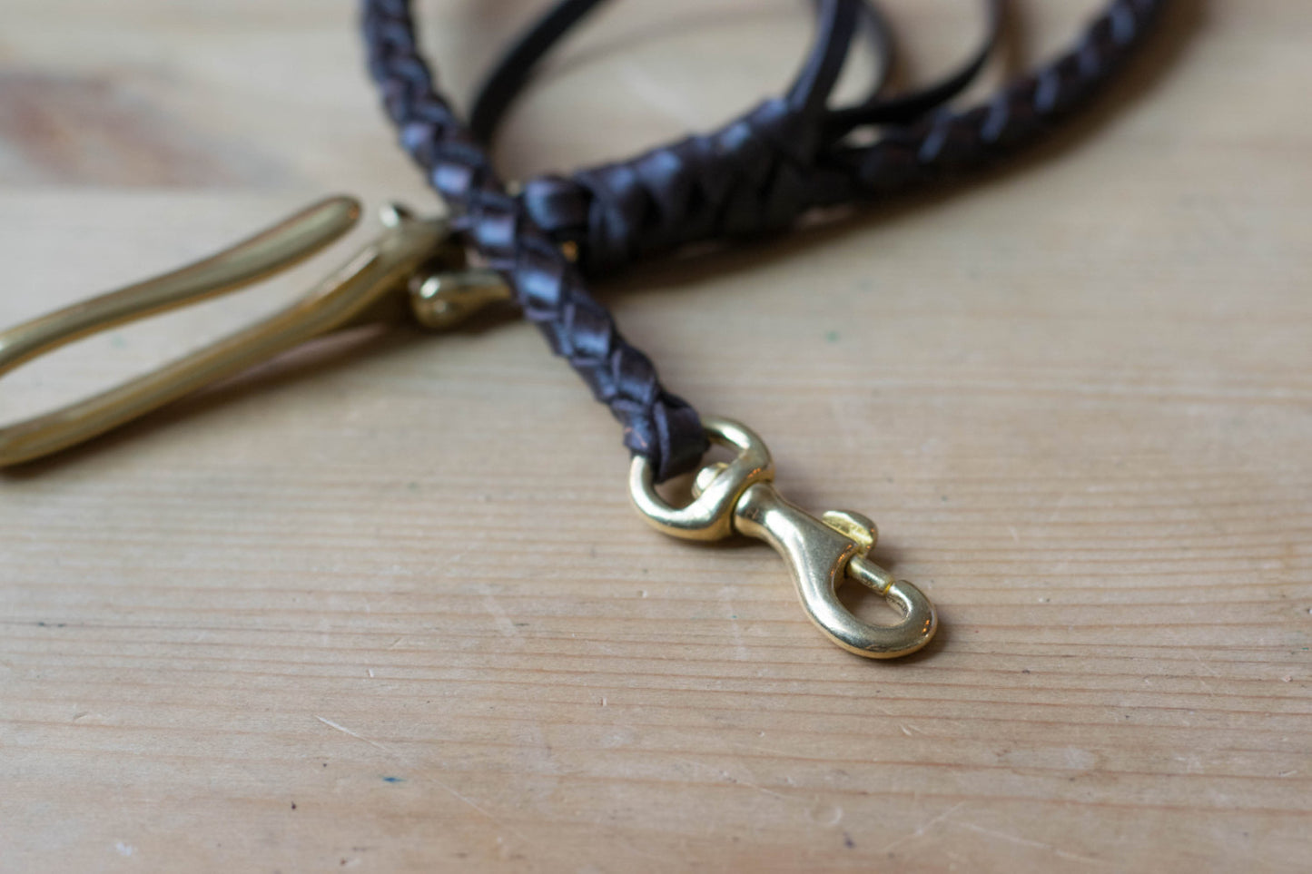 Brown braided leather strap with solid brass hardware - close up for solid brass snap
