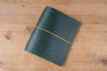 Green Buttero Leather Traveler's Notebook Cover with yellow elastic