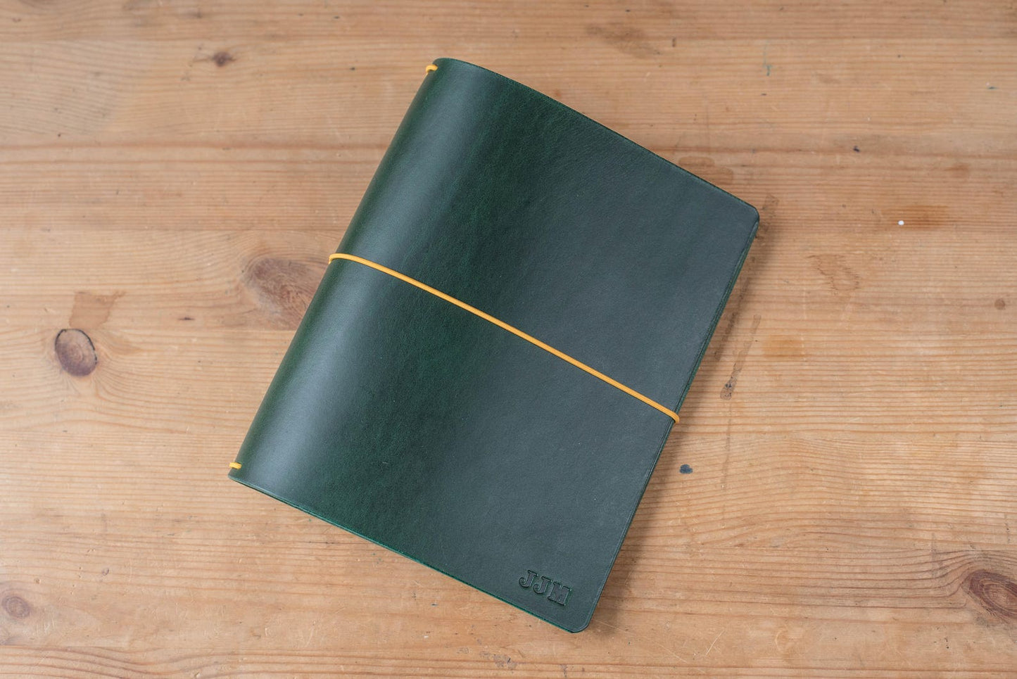 Green Buttero Leather Traveler's Notebook Cover with yellow elastic