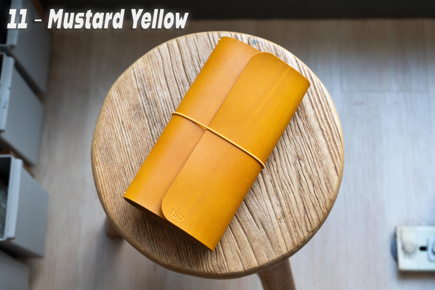 Mustard Yellow Buttero Leather Trifold Traveler's Notebook Cover with yellow elastic