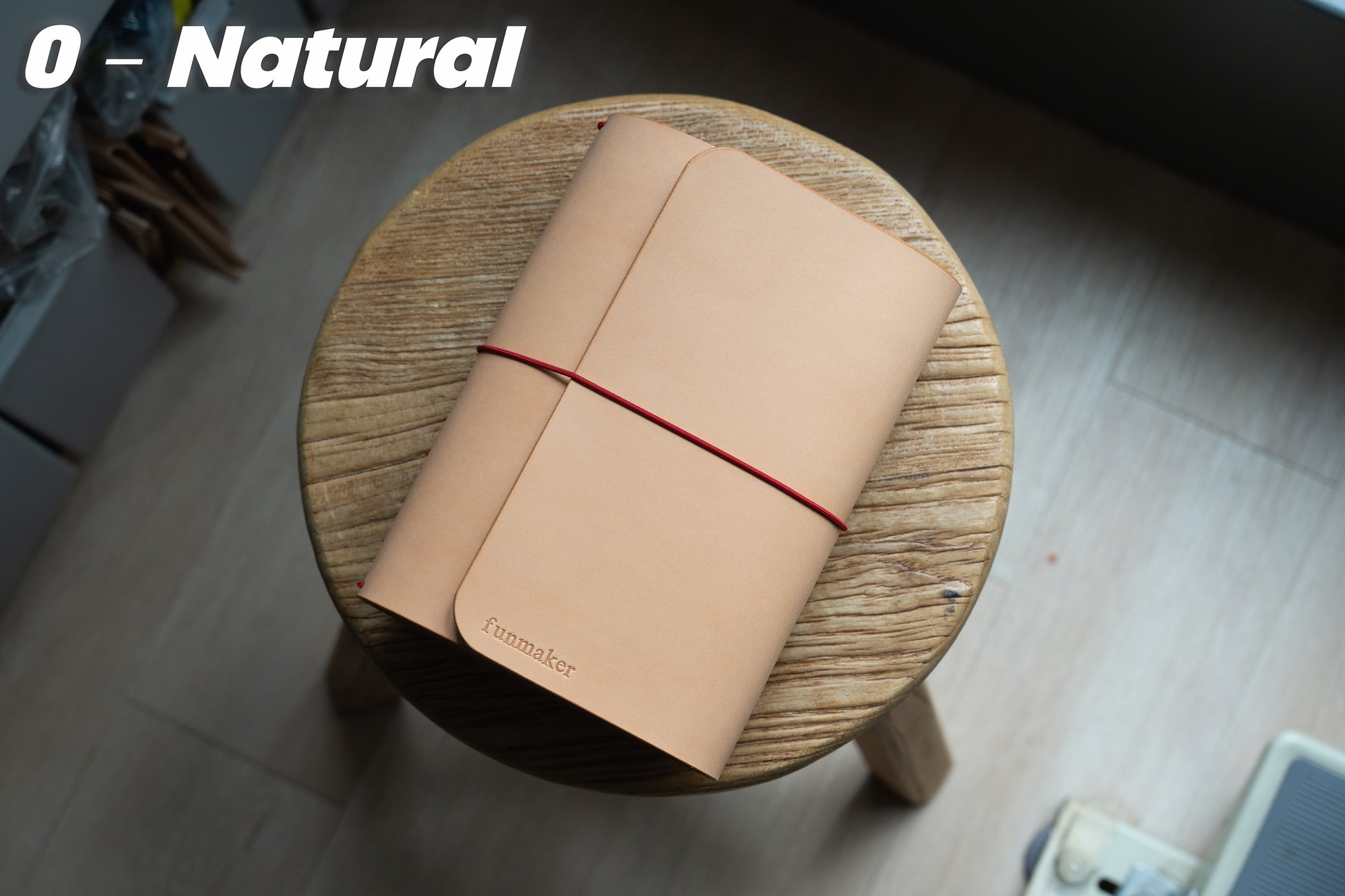 Natural Buttero Leather Trifold Traveler's Notebook Cover with red elastic