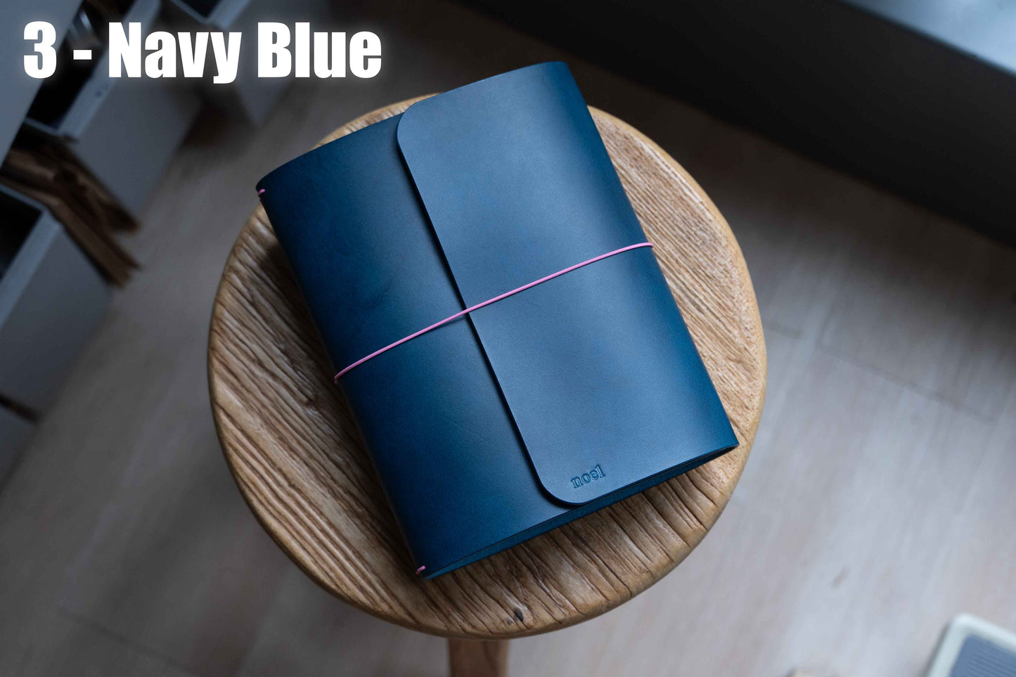Navy Blue Buttero Leather Trifold Traveler's Notebook Cover with pink elastic