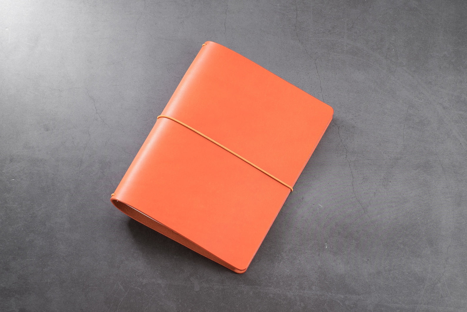 Orange Buttero Leather Traveler's Notebook Cover with yellow elastic