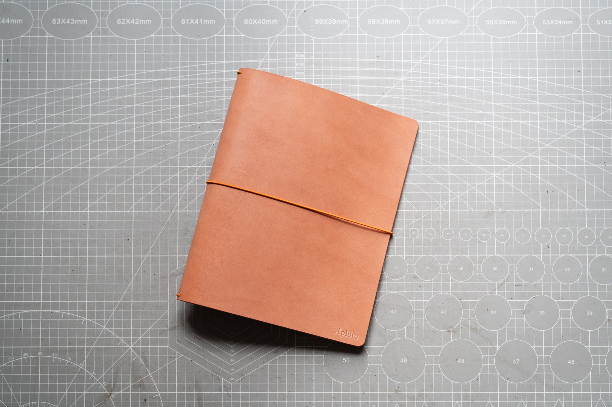 Pink Buttero Leather Traveler's Notebook Cover with yellow elastic