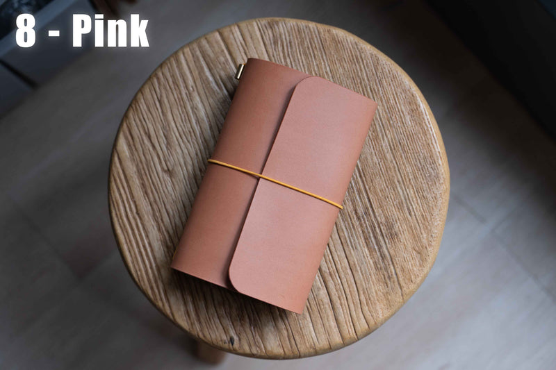 Pink Buttero Leather Trifold Traveler's Notebook Cover with yellow elastic