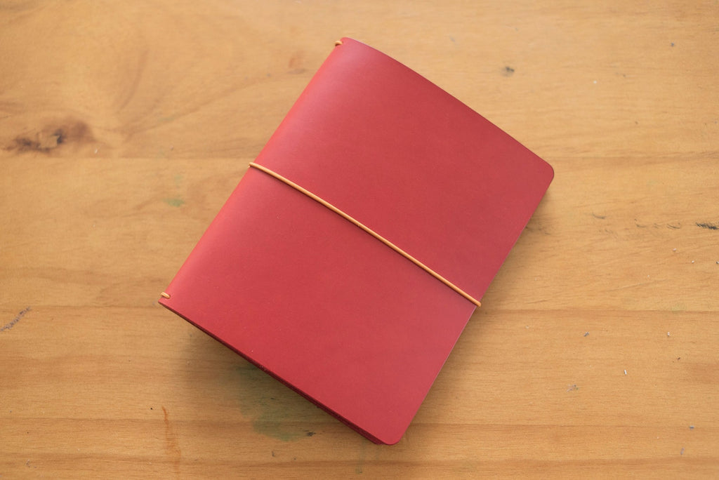 Red Buttero Leather Traveler's Notebook Cover with yellow elastic