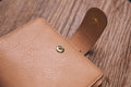 Organiseur de poche pour bagues en cuir grainé