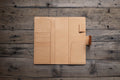 Couverture de carnet en cuir grainé bicolore avec fermeture à pression et emplacements pour cartes