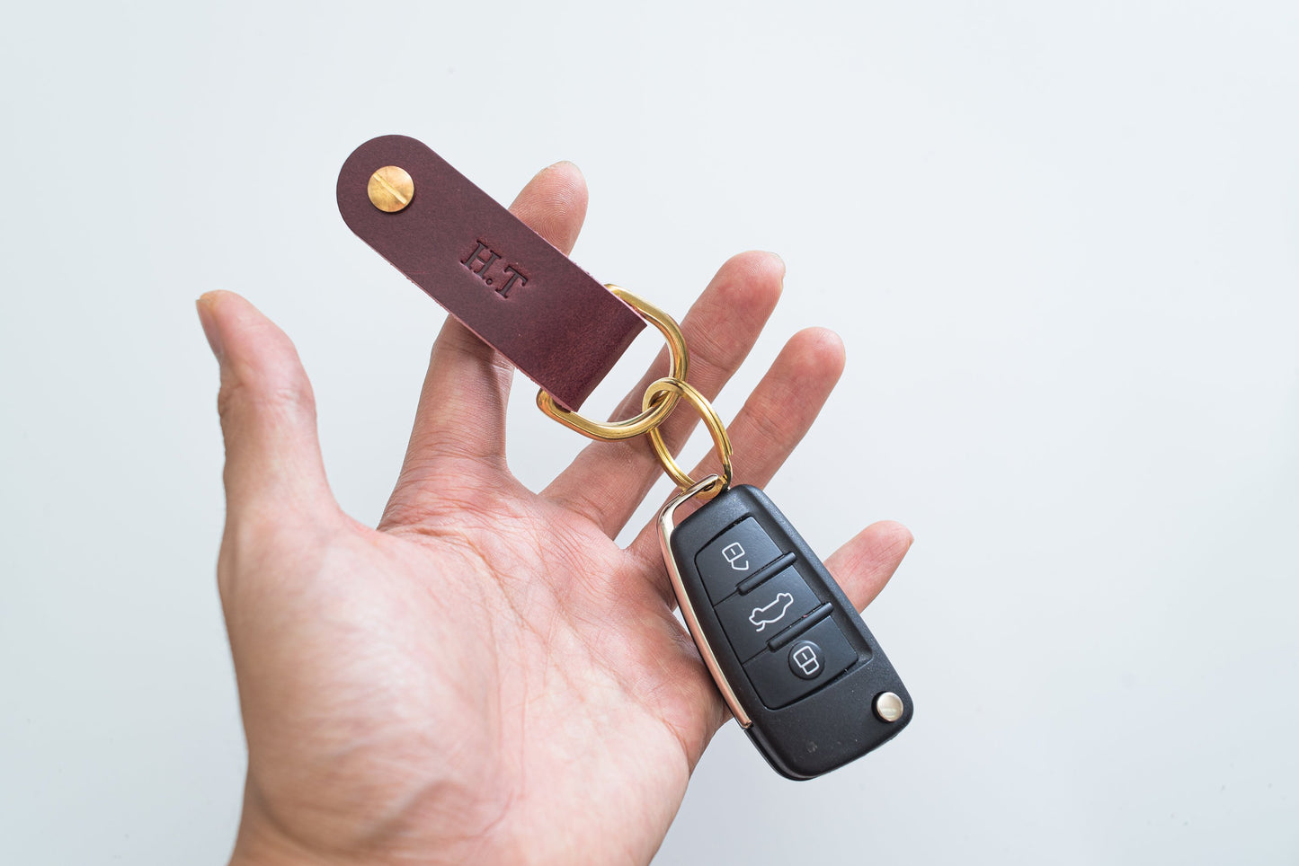 Burgundy Leather Swivel Key Holder with monogram and car key