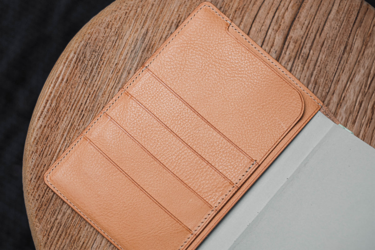 Close up for the card slots of a natural leather notebook cover