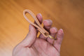 Natural Personalizable Leather Key Fob key holder with solid brass key ring and screws, side view of edge