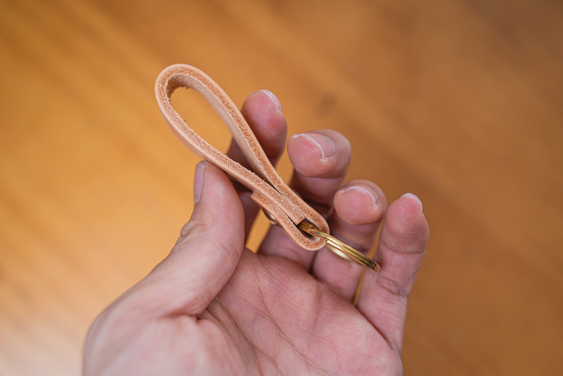 Natural Personalizable Leather Key Fob key holder with solid brass key ring and screws, side view of edge