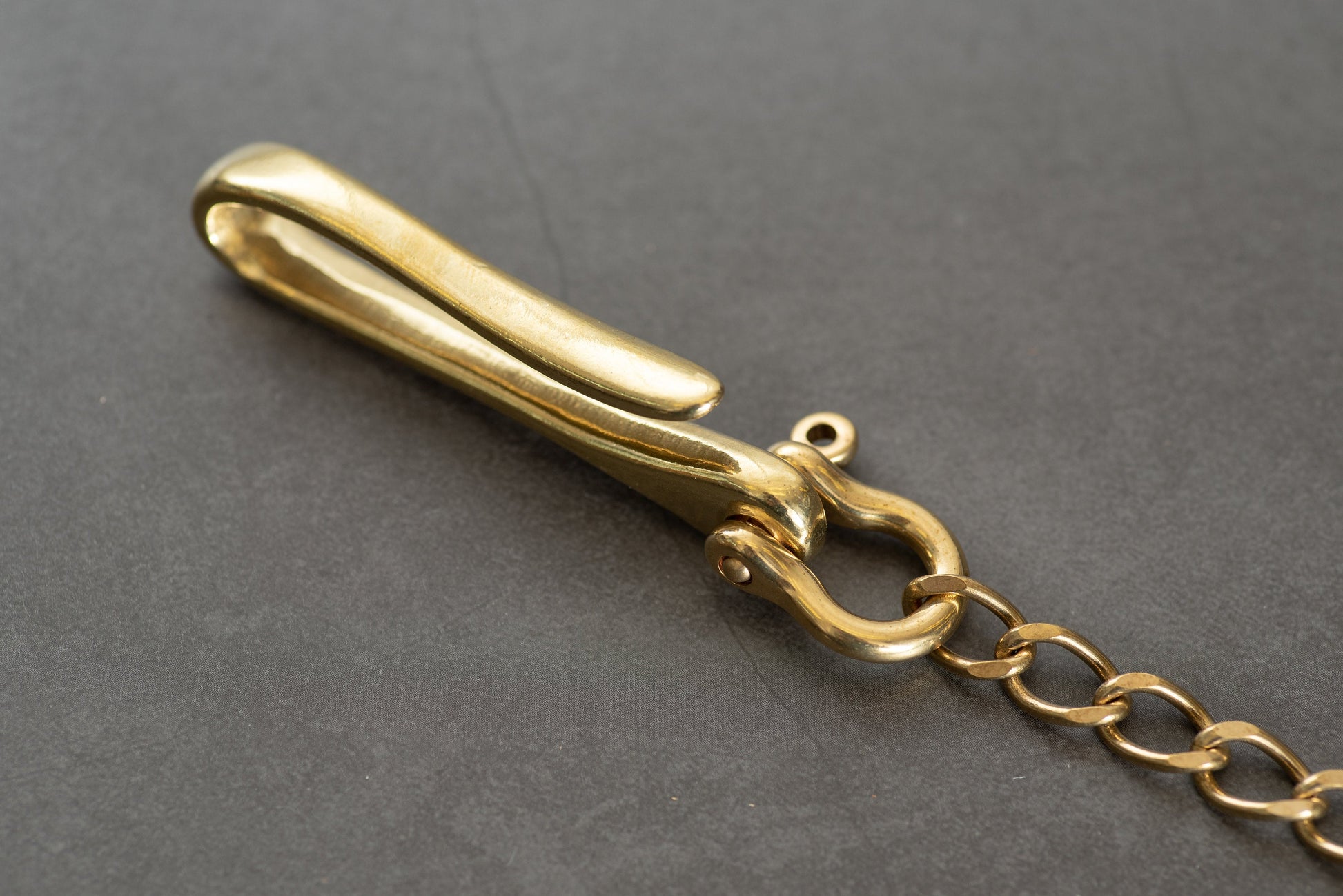 A solid brass wallet chain with a fish hook - close up for fish hook