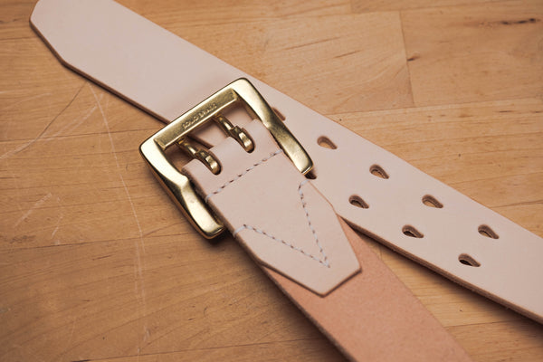 Full-grain Leather Stitched Double Garrison Belt - Detail shot of stitching and back side of solid brass buckle and belt tip and teardrop holes